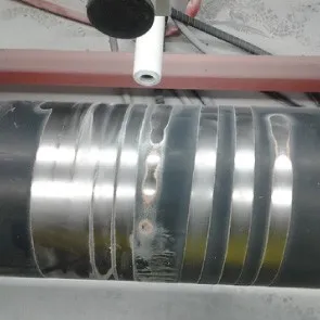 Pipework being cleaned by an automated Dry Ice Grit Blaster